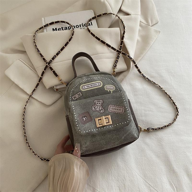 

Simple women s bag new shoulder design trendy crossbody cartoon fashion versatile backpack can be shoulder сірий колір