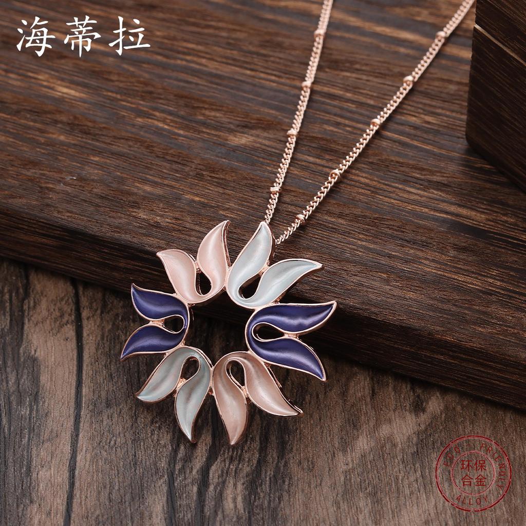 New color painting oil hollow sunflower pendant, women's personality versatile geometric flower necklace