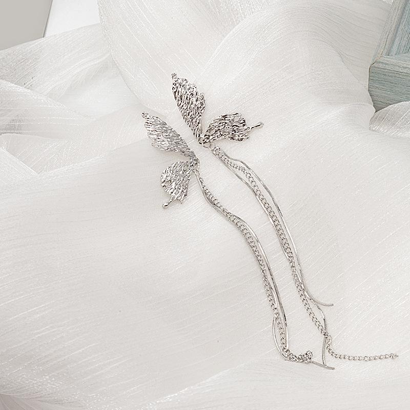 Silver Needle Asymmetrical Butterfly Tassel Earrings with Concave-Convex Texture and Long Stud Design