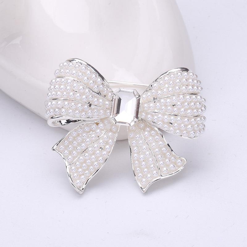 

Сладкий ветер сплав жемчуг бант брошь темперамент одежда аксессуары булавка серебряный