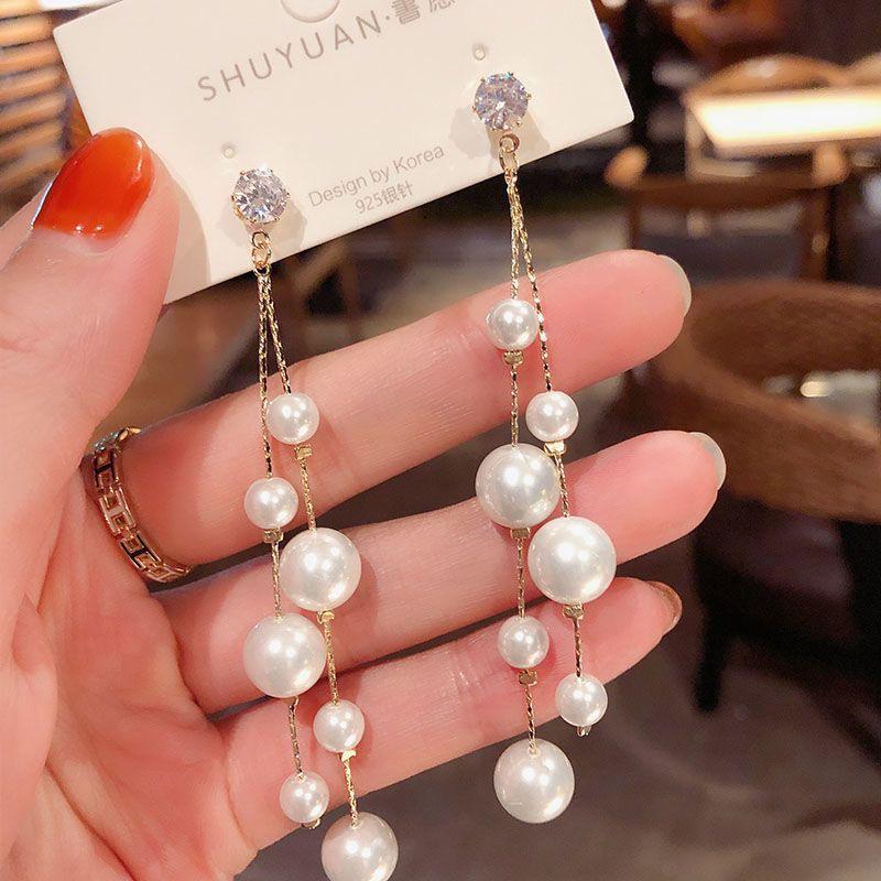 Korean Dongdaemun Long Pearl Fashion Earrings: Elegant Dangle with Versatile Silver Studs белый