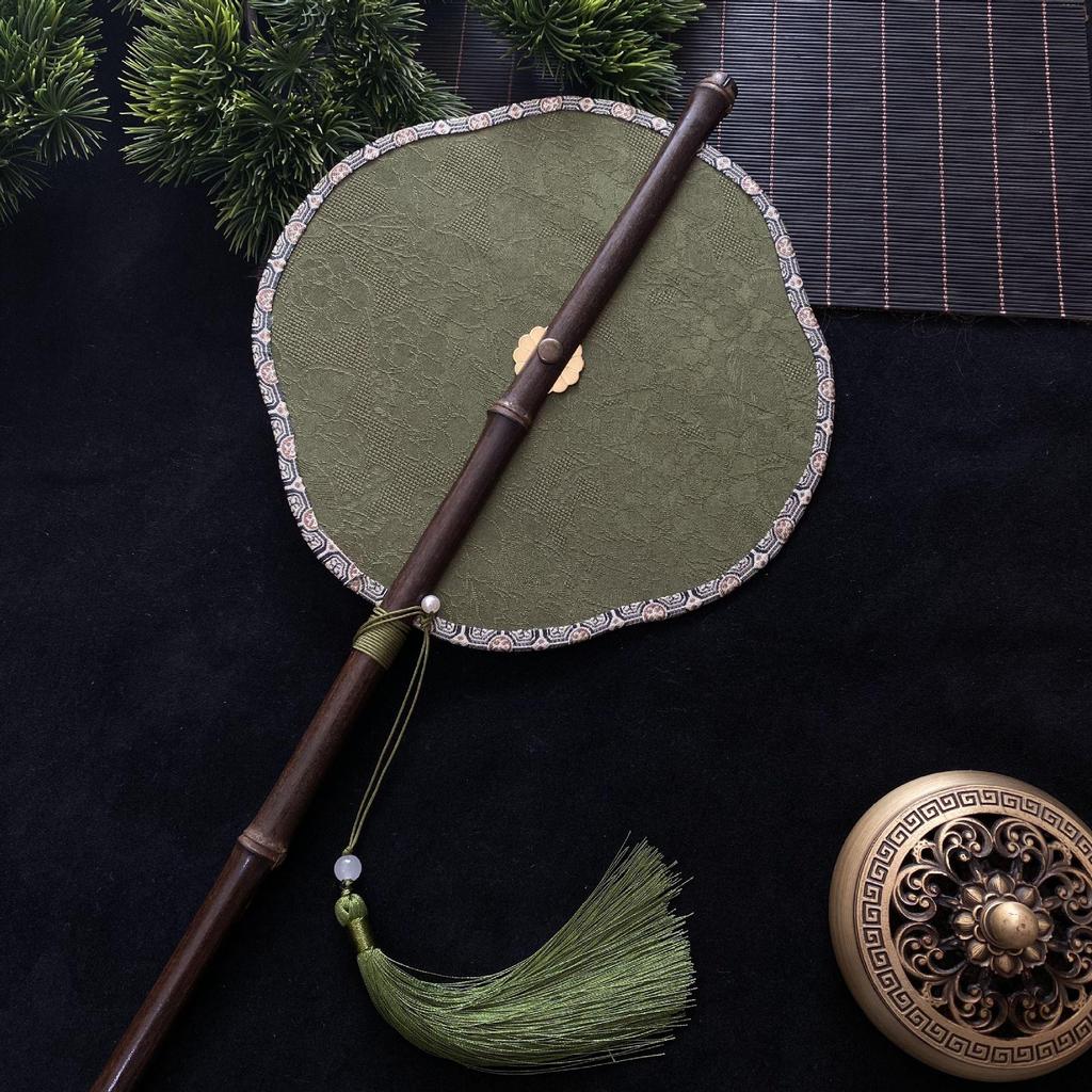 Hanfu Round Fan: Ancient-Style Purple Bamboo with Long Handle, Tassel, and Foldable Design.
