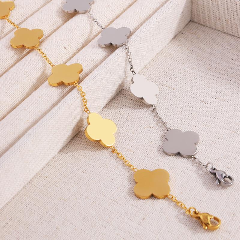 Titanium Steel Bracelet - Luxury Four-leaf Clover Bracelet for Sophisticated Women. Fashionable and Niche Couple's Flower-shaped Jewelry Bracelet.