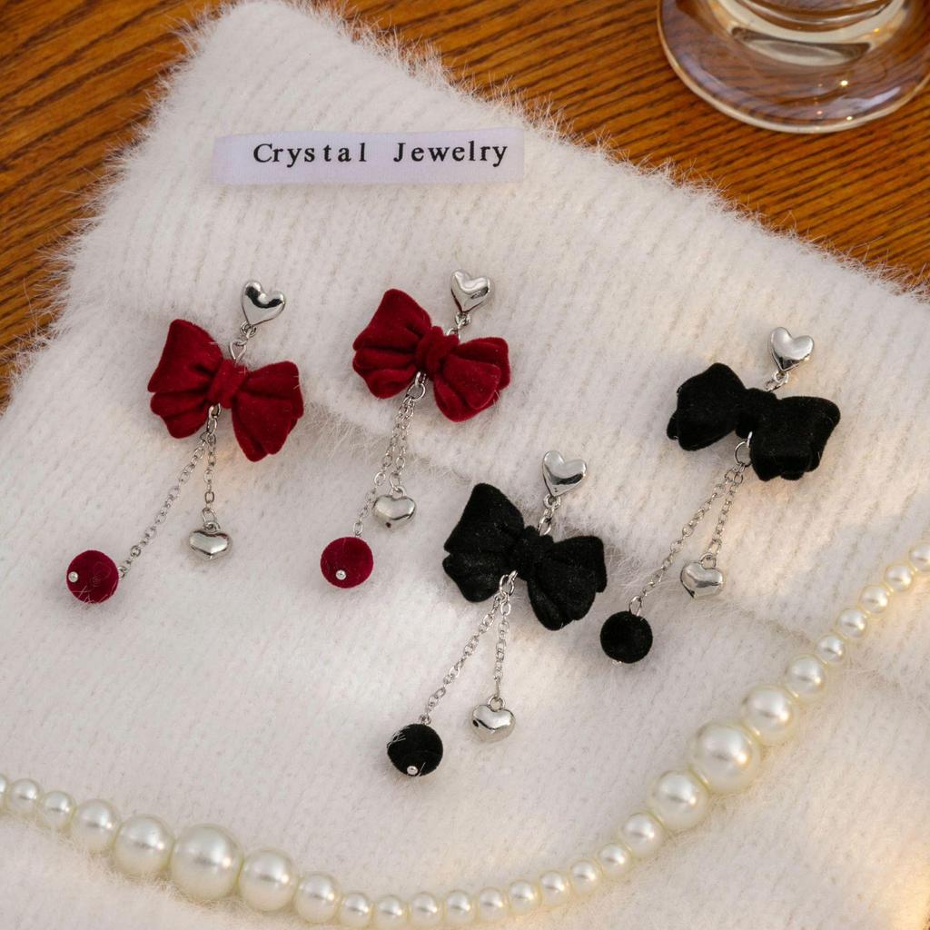 Boucles d'oreilles pendantes cœur avec nœud floqué haut de gamme et longues pampilles pour femmes
