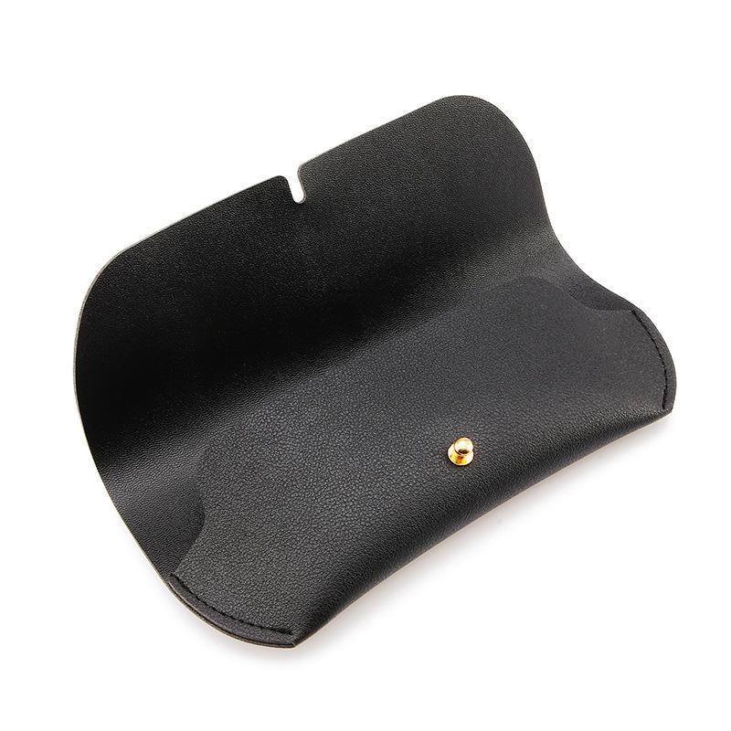 Luxury Leather Eyeglass Kit: Soft Case, Cleaning Cloth, Pouch, Screwdriver, Strap, and Buckle.