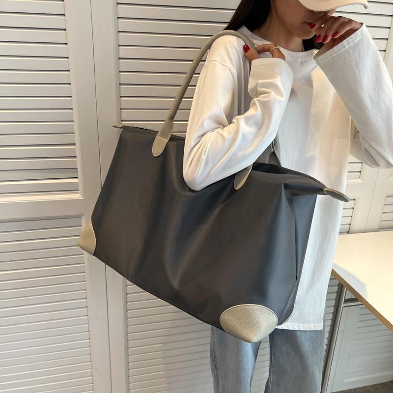 Travel bag Women's large-capacity business trip tie rod luggage bag Birth bag Storage bag Sports fitness bag Yoga bag