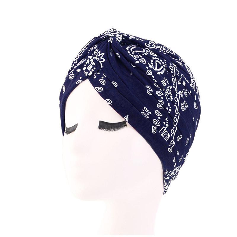 Turbanmütze für Damen mit Leoparden- und Schlangenhaut-Blumendruck und Knoten