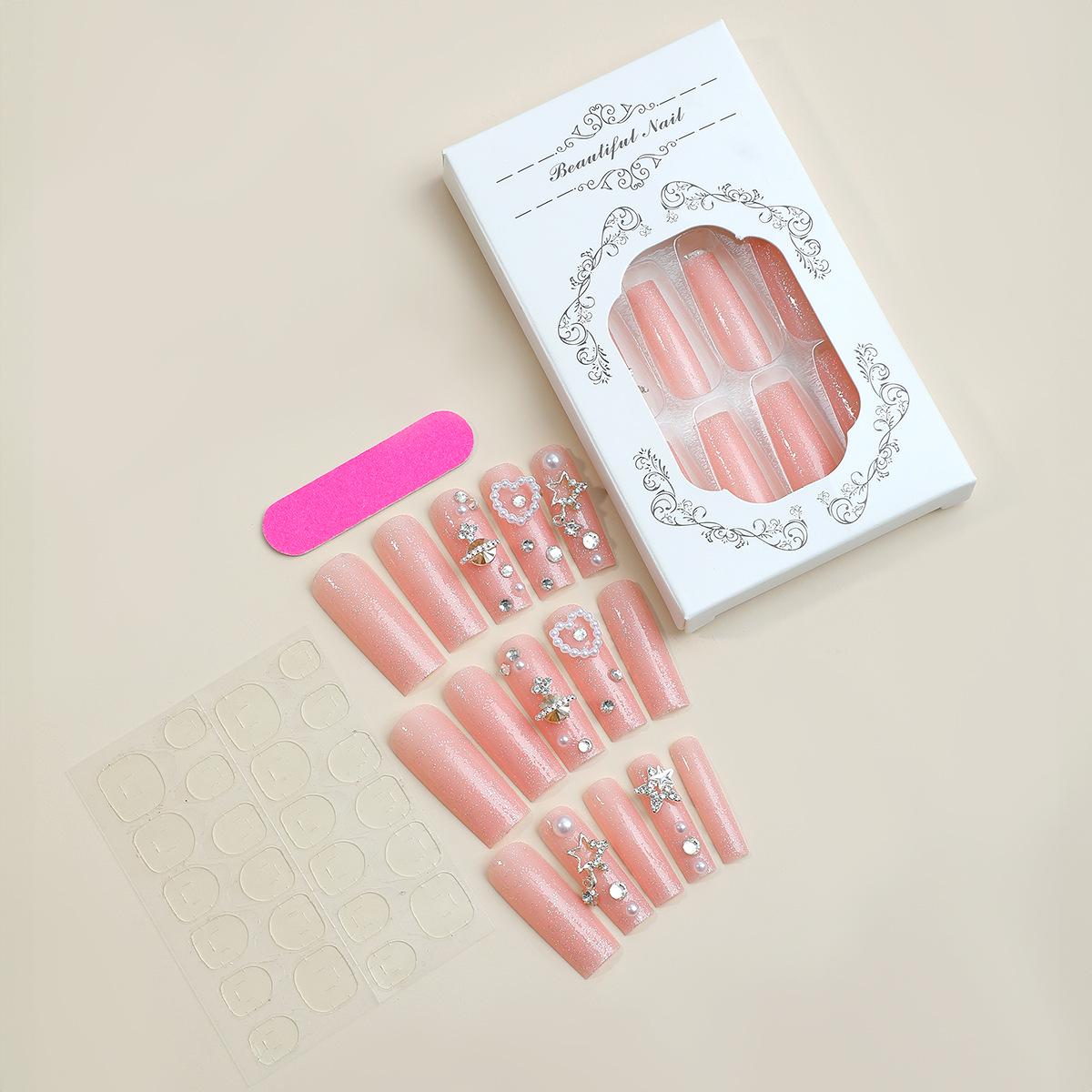 

Очень длинные накладные типсы для ногтей в виде трубок с 3D дизайном в виде звезд, жемчуга и сердечек