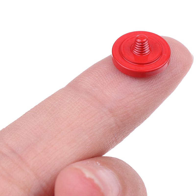 Kovová spoušť fotoaparátu s konkávním povrchem Mosazné uvolňovací tlačítko Příslušenství k fotoaparátům