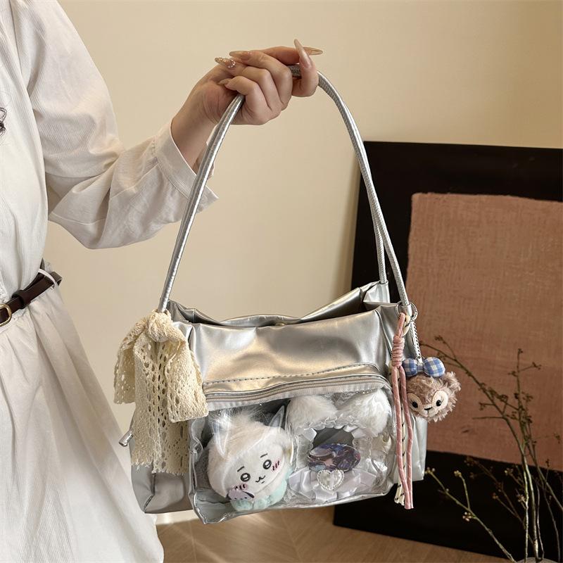 Large capacity transparent shoulder bag, new girl doll bag, casual tote bag, two-dimensional student portable messenger bag.