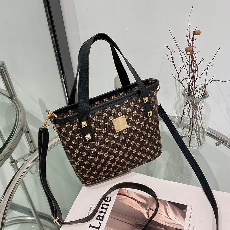 Women's bag, new spring and summer temperament, retro oblique span bucket bag, a portable underlay flower bucket