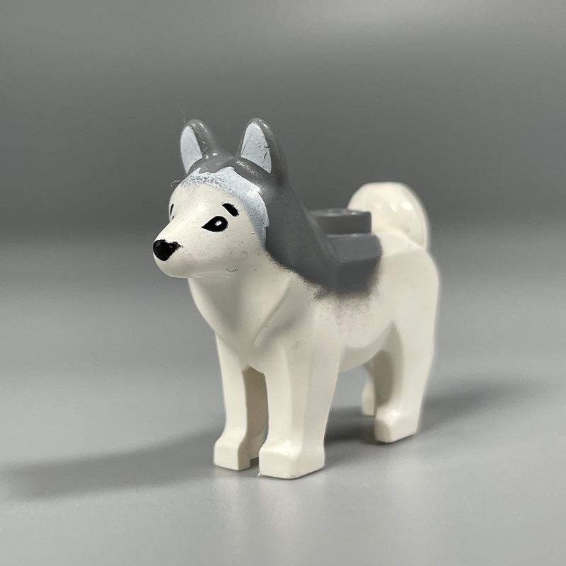 Beleuchtetes arktisches Tier-Baustein-Set: Pinguin, Eisbär, Husky & Wolf Iglu.