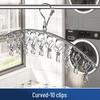 Stainless Steel Multifunctional Windproof Sock and Clothes Hanger with Clips for Home and Dorm Use.