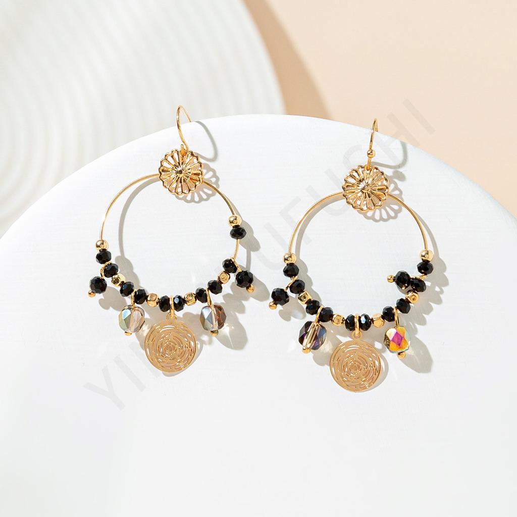 Exotic hollow fringed pendant earrings European and American women's vacation style earrings fashion earrings