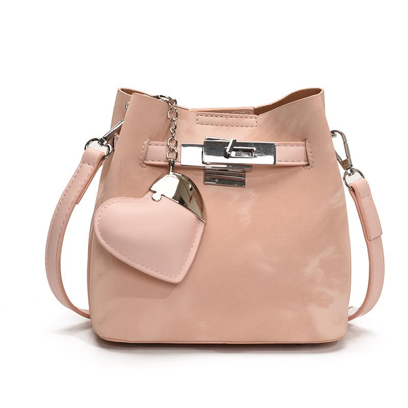 Spring and summer new Korean fashion high-end texture bucket bag niche design fashionable commuter versatile messenger women's bag