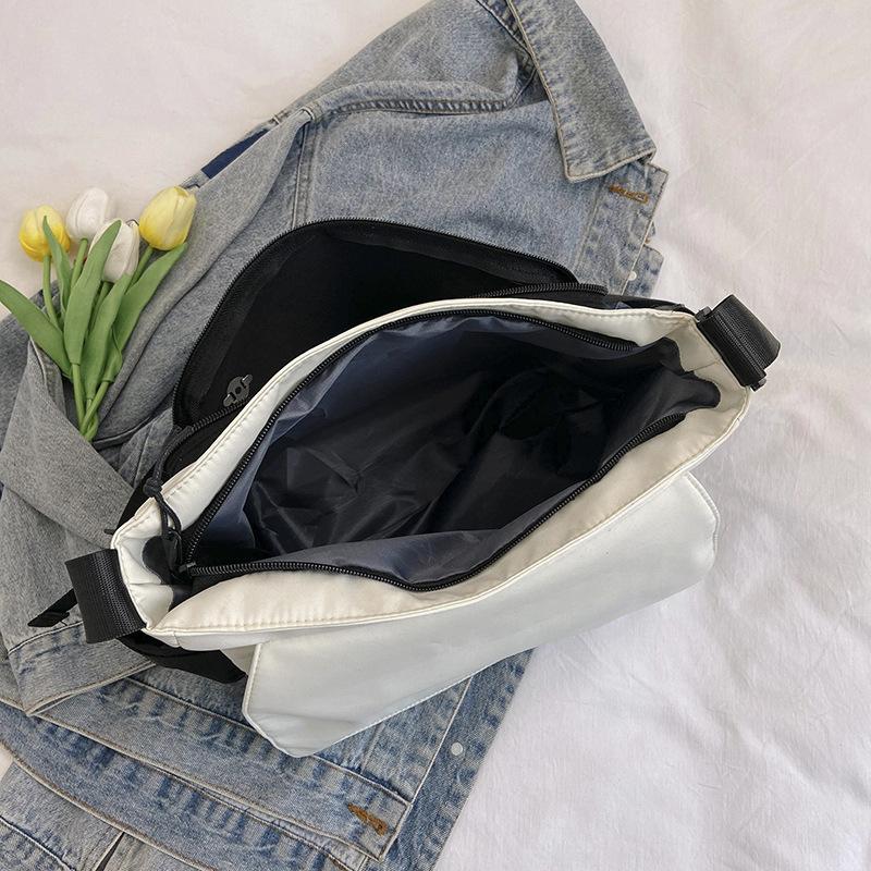 Small fresh and versatile women's new mailman bag color matching high value campus students make-up class crossbody soft girl class backpack