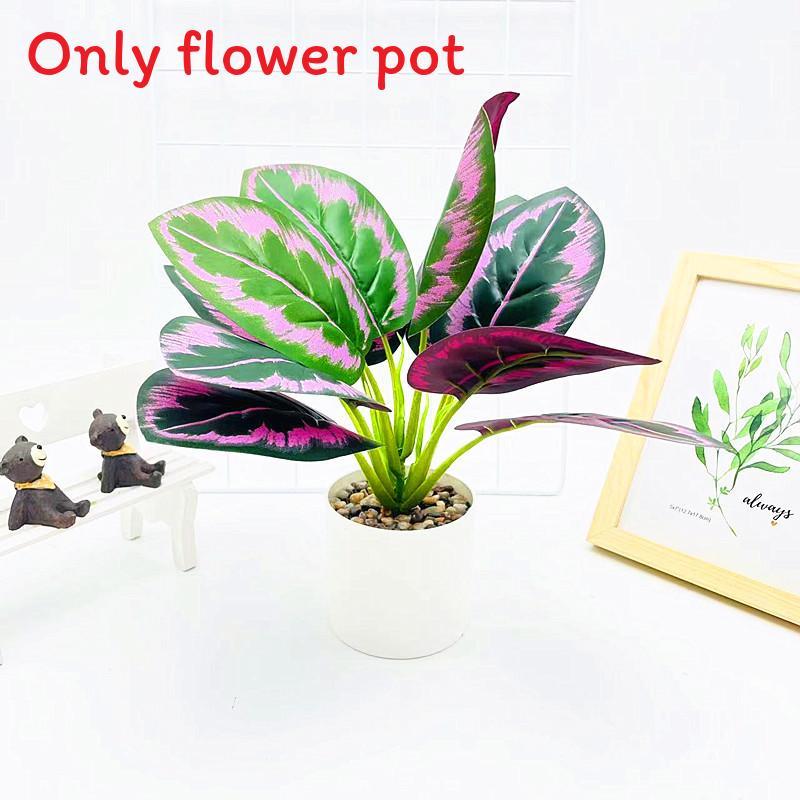 Simulated Epipremnum Aureum And Dasheen Leaves Potted For Home And Events