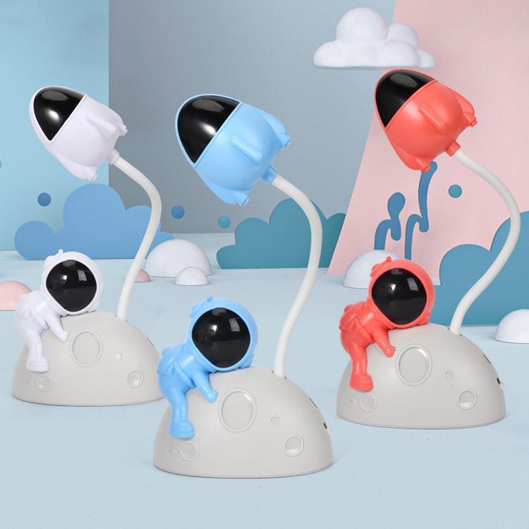 Astronaut LED Night Light: Moon Man Bedside Lamp for Student Dorms, Reading, and Desk Atmosphere.