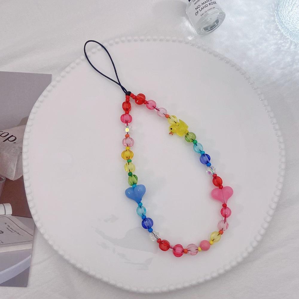 

The same INS lantern beads in Japan and South Korea, love little yellow duck and bear fashion anti-lost hand carry pendant mobile phone chain