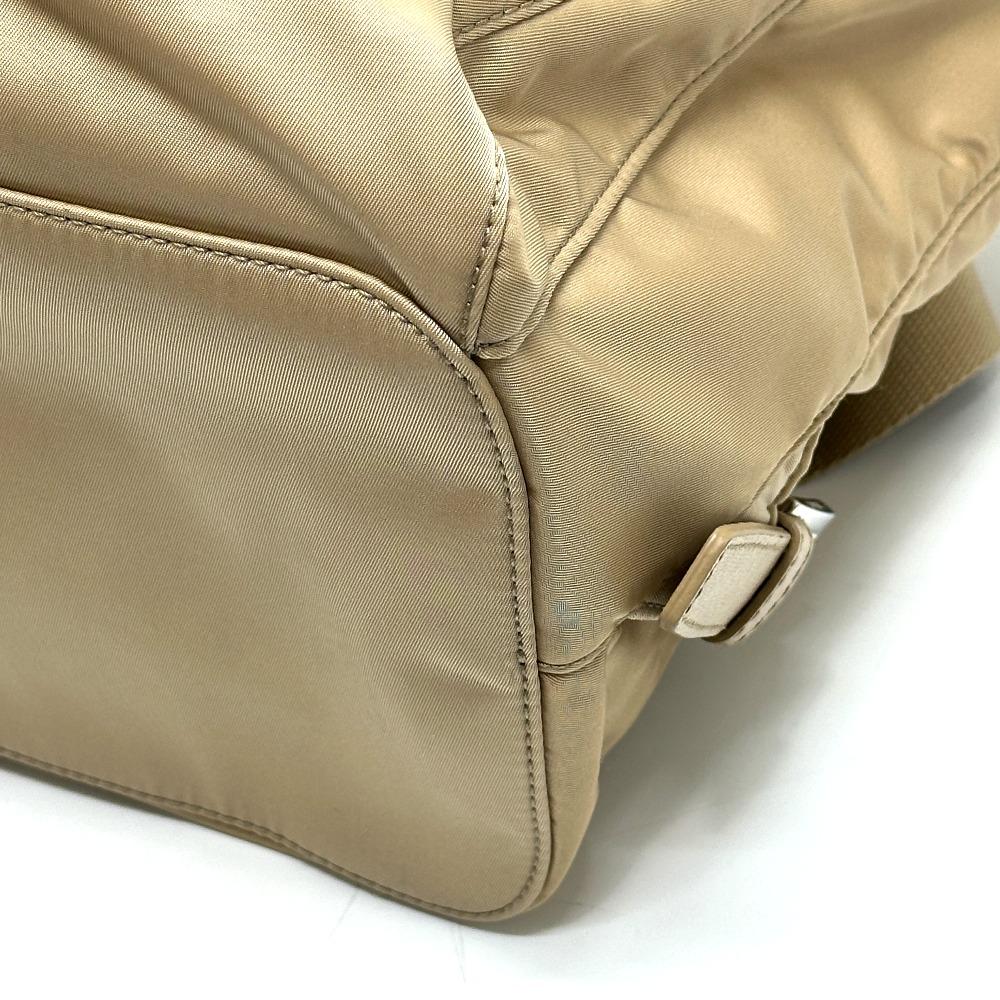 PRADA 1BZ811 Triangle logo Backpack with double pockets and pouch Nylon Beige