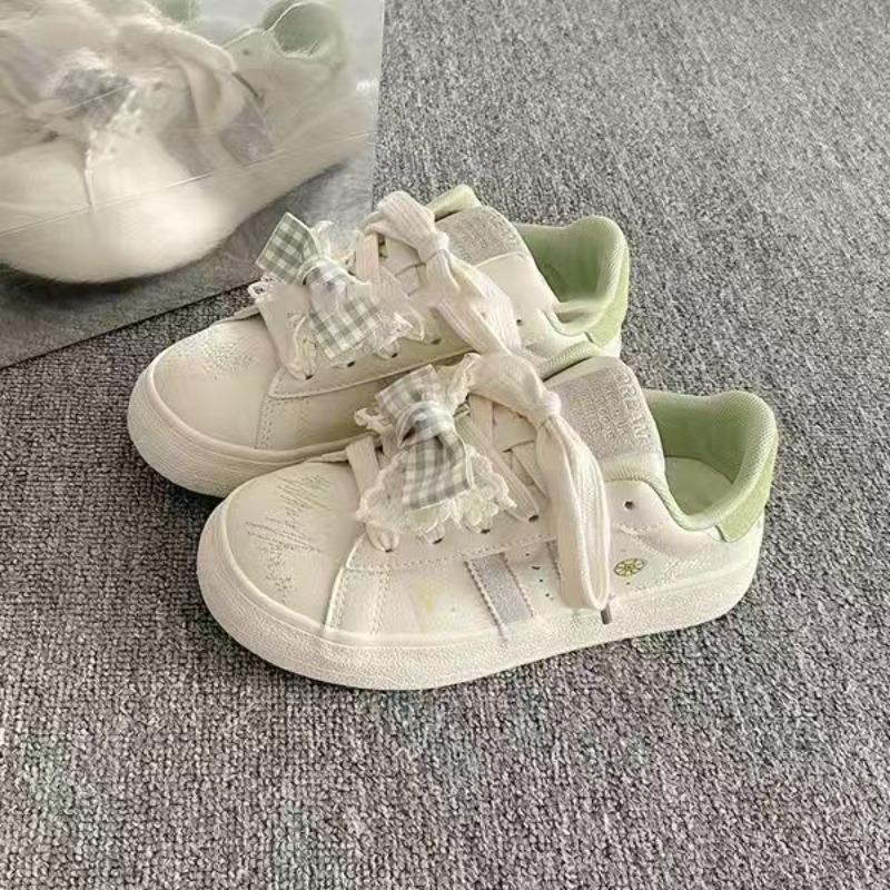 Guochao Nische Schleife Graffiti Druck kleine weiße Schuhe Damen Frühling neu vielseitige lässige Board Schuhe