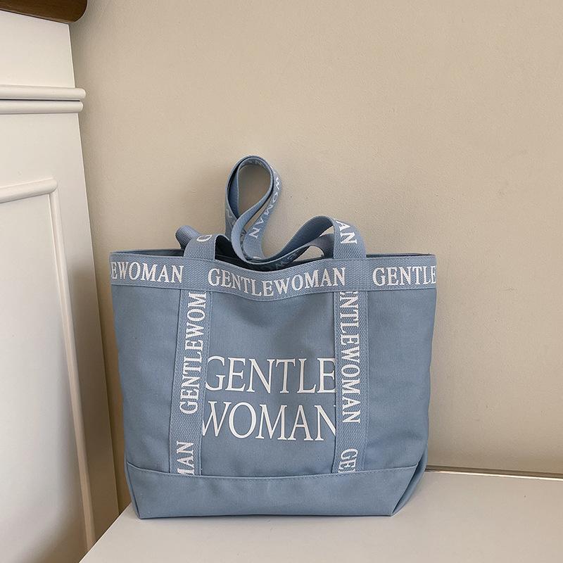 Korean version of fashionable women's bags 2025 new retro student class casual foreign style tote bag shoulder handbag