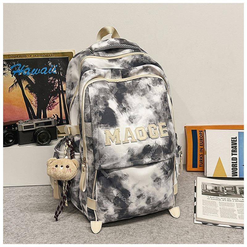 Der neue Schulranzen ist hochwertig, frisch und süß, ein Rucksack mit literarischem Graffiti-Tie-Dye und ein leichter Rucksack für Junior- und Oberstufenschüler.