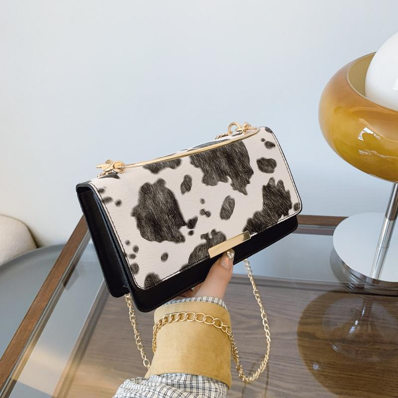 Yogodlns Women PU Leather Small Handbag Cow Print Crossbody Shoulder Bag for Work Daily Shopping Travel Phone Purse