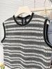 Korean Retro Hollow Sleeveless T-shirt with Tassel Hem - Summer 2024 Women's Western-Style Top