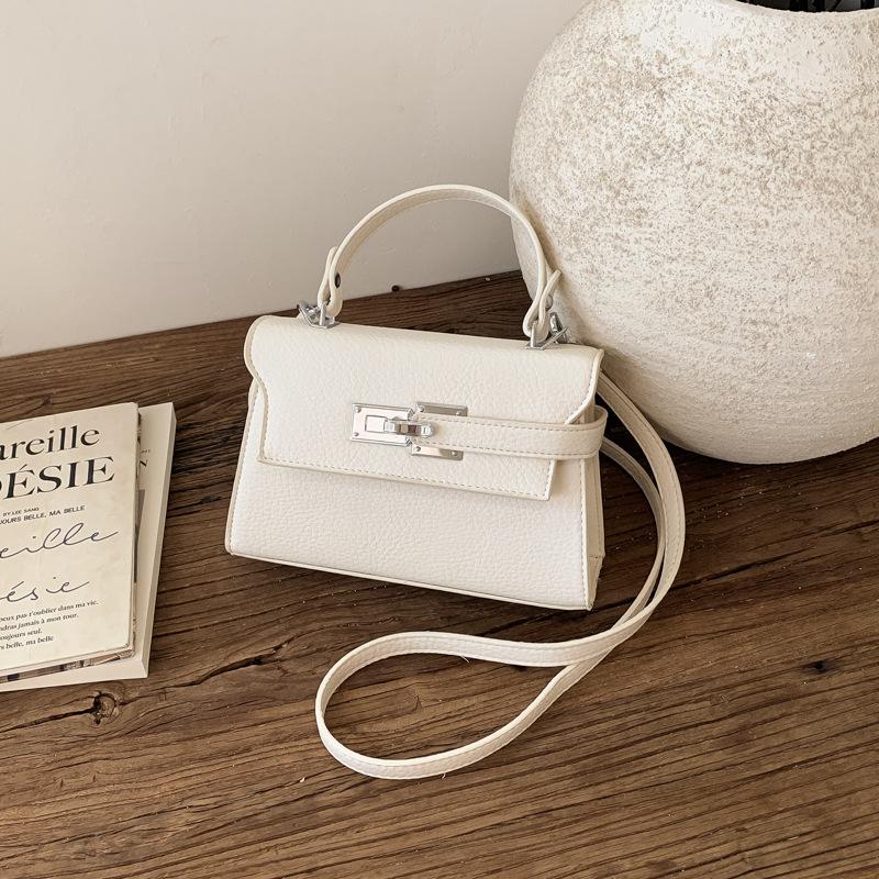 Elegant Commuting Bag for Work with A Chic Kelly Bag Style, Single-shoulder Cross-body Design.