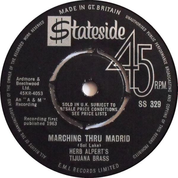 

7inch Record HERB ALPERT S TIJUANA BRASS - Marching Thru Madrid SS329 STATESIDE 1963 UK Jazz Used