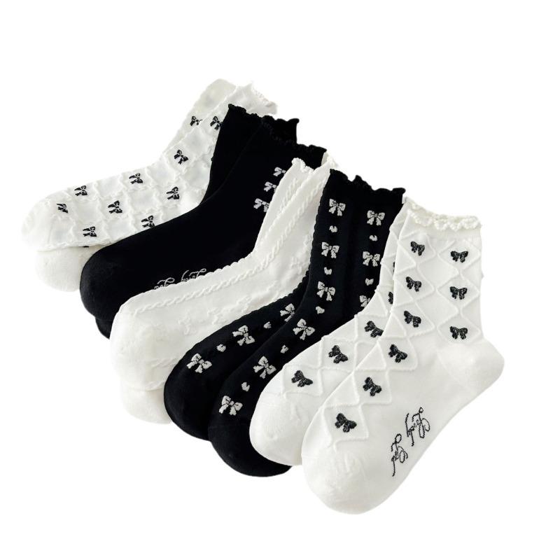 Chaussettes mi-mollet pour femmes, Chaussettes en dentelle pour femmes automne et hiver, Chaussettes en coton polyvalentes à nœud, Chaussettes hautes noires et blanches à bordure oreille