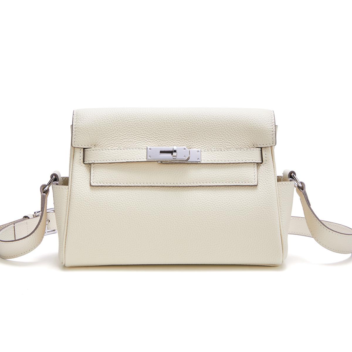 Purple Rose 2025 Nieuwe Togo Toplaag Koeienhuid Tas Stijlvol En Sfeervol Echt Leer Postman Tas Grote Capaciteit Enkele Schouder Diagonaal Crossbody Tas 25x10x20cm wit