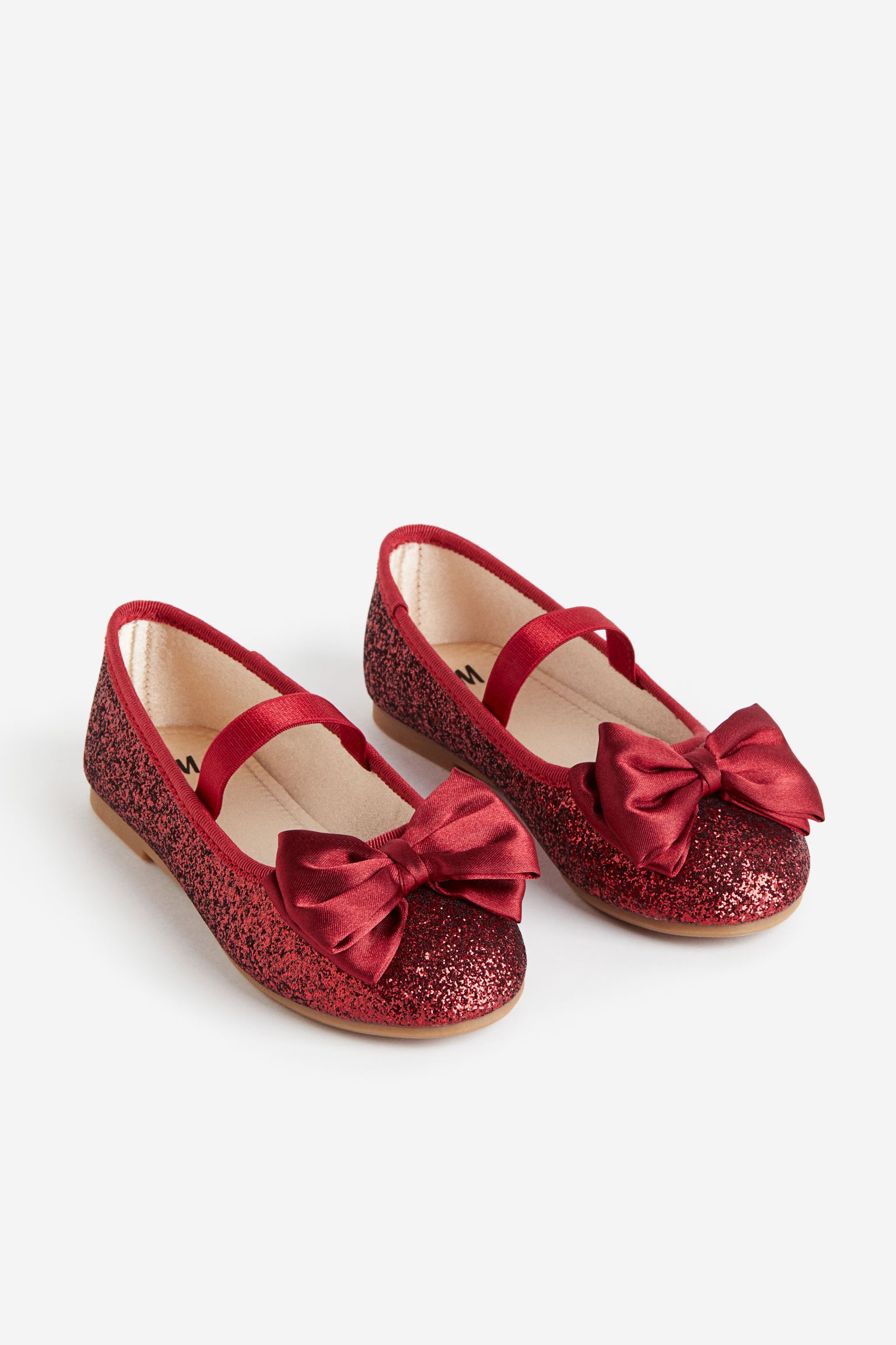 

Балетки с аппликациями