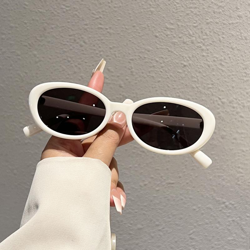 Retro cat eye personalized sunglasses women s oval small frame UV protection trend street shot hip hop sunglasses