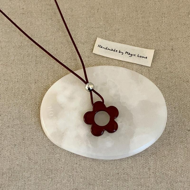 Delicate Long Leather Cord Necklace with Intricate Flower Charm Ideal for Fashion Forward Women Seeking Unique Accessories