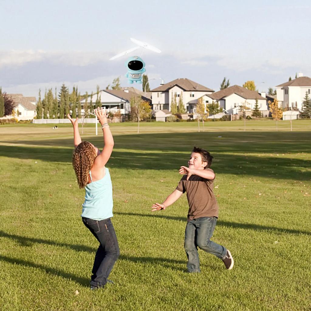 Flying Robot Helicopter UFO Luminous Toys Spaceman Plane Aircraft Dron Machine Indoor Outdoor Games Toys for Children Boys Girls