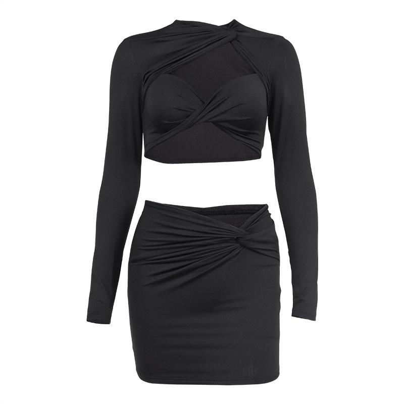 Popular European and American new women's clothing hollow long-sleeved top pleated hip-wrapped short skirt two-piece set, suit women