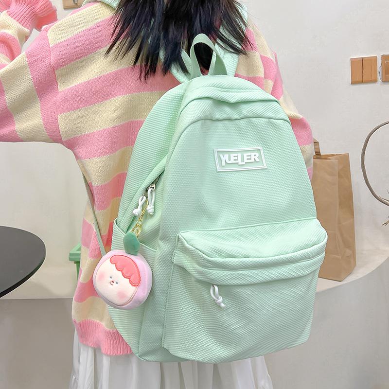 Student backpack Women's new large-capacity outdoor lightweight schoolbag Middle school student candy-colored backpack