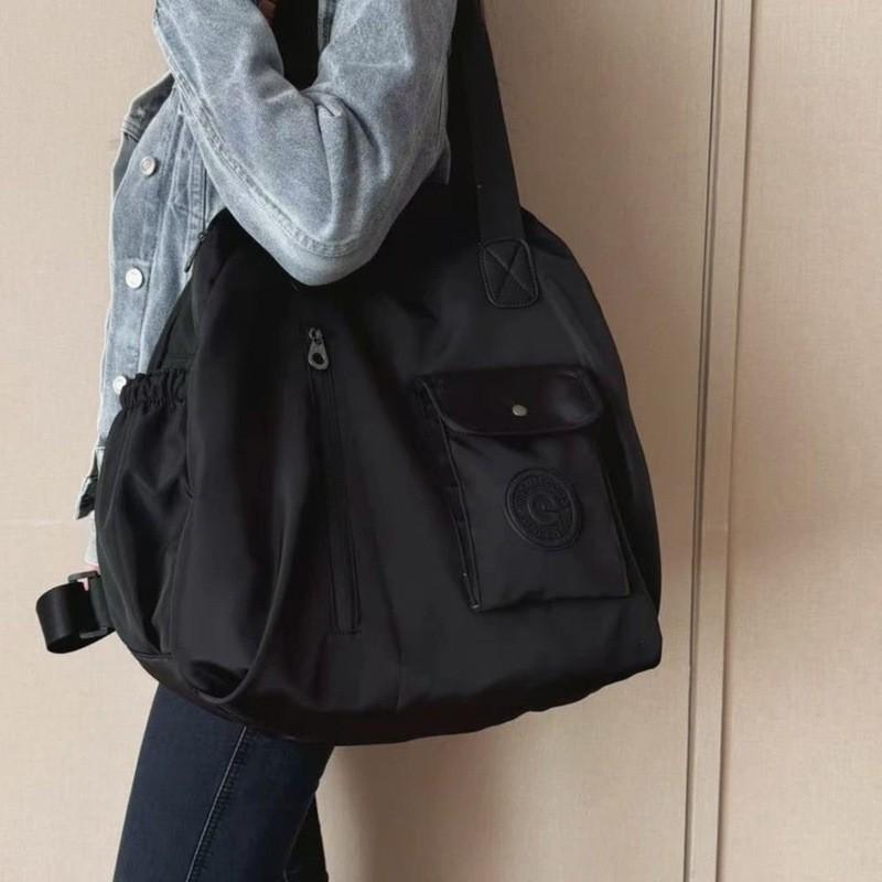 New large-capacity backpack women s leisure travel backpack fashionable versatile waterproof Oxford cloth bag