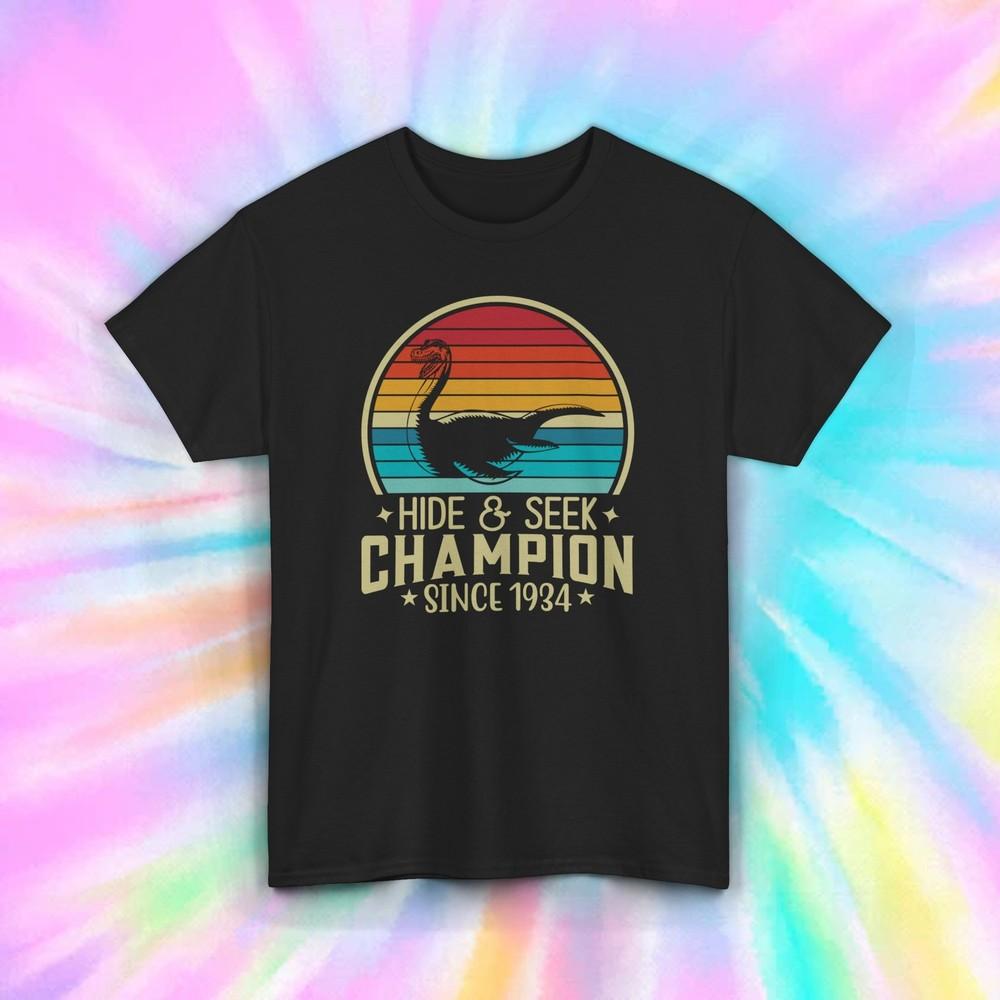 

Hide and Seek Champion Loch Ness Monster T-Shirt | Funny Retro Graphic Tee | S-5XL L