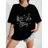 White Oversized T-Shirt With Floral Design And She Is Strong Text For Casual Wear