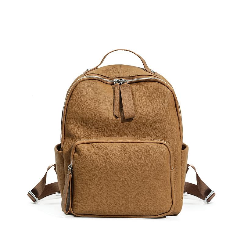 School bag, large-capacity student travel backpack, can hold computer travel, lightweight, high-end leather women's backpack.