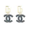 Eleganti Orecchini Pendenti con Ciondolo Doppia C - Design a Croce Versatile ed Elegante con Fascino di Lusso
