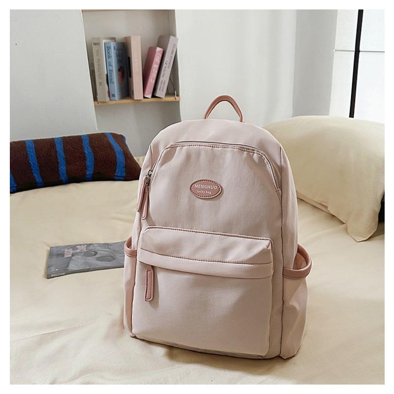 Fresh and sweet candy color backpack for junior high school students, solid color, simple and large-capacity backpack.