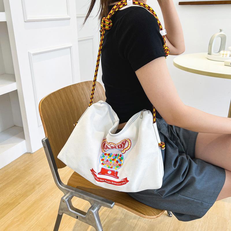 Bag 2025 summer new casual Korean version donut printed canvas bag bag large capacity student schoolbag shoulder bag