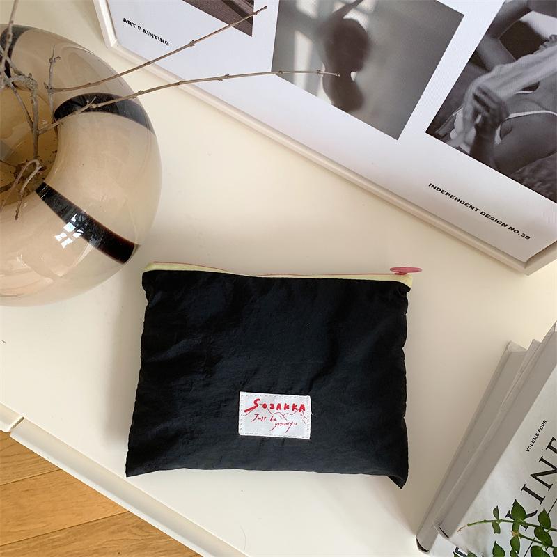 Korean niche design ice cream color cosmetic bag small object storage bag letter clutch bag change bag