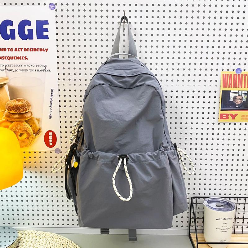 Schoolbag Solid Color Nylon Backpack Women's 1011 Summer New Large Capacity Middle and High School Student School Bag Lightweight Travel Bag