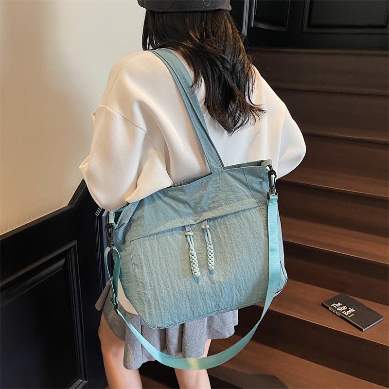 Simple large capacity canvas bag women's casual solid color commuting shoulder tote bag college students class sleigh bag schoolbag