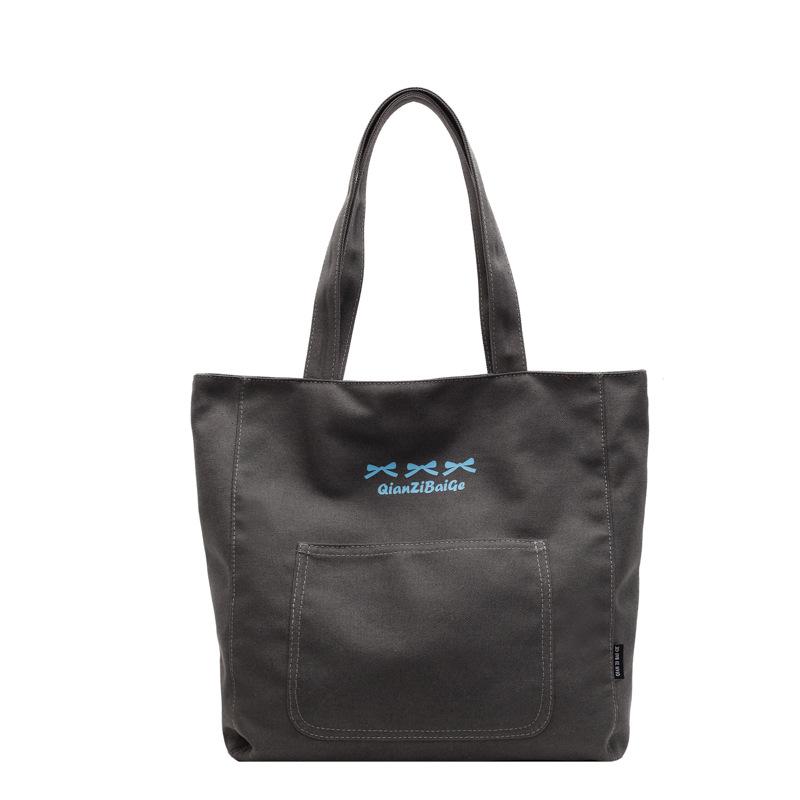 Einfache und geräumige Umhängetasche 2025 neue literarische und vielseitige Tragetasche für Studenten